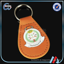 Runder lederner dreieckwagen keychain